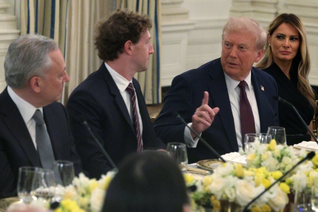 WASHINGTON, DC - SEPTEMBER 04: (L-R) White House ???AI and Crypto Czar??? David Scahs, Meta CEO Mark Zuckerberg, U.S. President Donald Trump and first lady Melania Trump share a moment during a dinner at the State Dining Room of the White House on September 4, 2025 in Washington, DC. President Trump hosted tech and business leaders for dinner after they joined the first lady???s meeting of the Artificial Intelligence (AI) Education Task Force at the White House this afternoon. (Photo by Alex Wong/Getty Images)