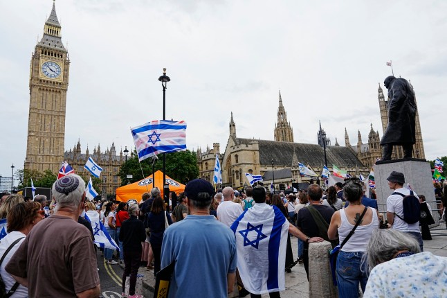 Protesters gather at the end of a 'march against antisemitism' demonstration in Parliament Square in central London, on September 7, 2025, (Photo by CARLOS JASSO / AFP) (Photo by CARLOS JASSO/AFP via Getty Images)