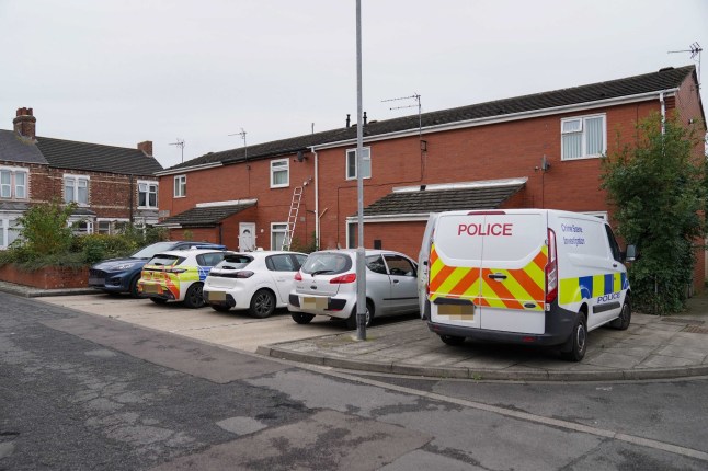 A police car outside an address in Thornaby.