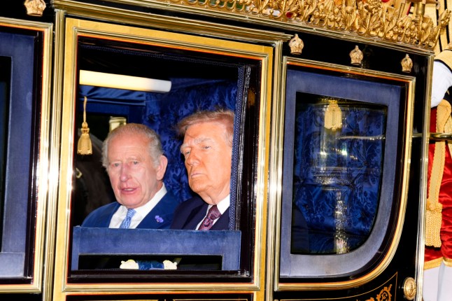 King Charles III and US President Donald Trump during the carriage procession to Windsor Castle, Berkshire, ahead of the ceremonial welcome on day one of the US President's second state visit to the UK. Picture date: Wednesday September 17, 2025. PA Photo. Photo credit should read: Jordan Pettitt/PA Wire