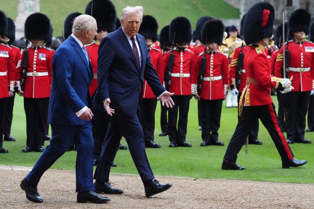 King Charles III (left) and US President Donald Trump review the guard of honour during the ceremonial welcome at Windsor Castle, Berkshire, on day one of the president's second state visit to the UK. Picture date: Wednesday September 17, 2025. PA Photo. Photo credit should read: Jonathan Brady/PA Wire