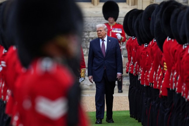 President Donald Trump reviews the Guard of Honour after the arrival at Windsor Castle in Windsor, England, Wednesday, Sept. 17, 2025. Kirsty Wigglesworth/Pool via REUTERS