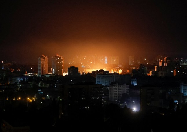 An explosion of a drone lights up the sky over the city during a Russian drone strike, amid Russia's attack on Ukraine, in Kyiv, Ukraine September 19, 2025. REUTERS/Gleb Garanich
