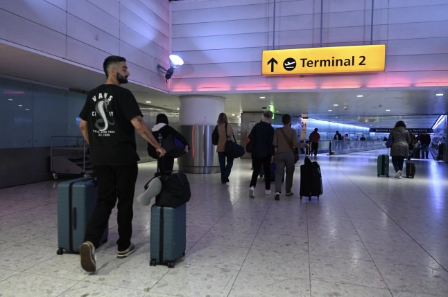 LONDON, UNITED KINGDOM - SEPTEMBER 20: Technical issue causes by a cyberattack on a third-party system provider led to congestion in Heathrow Airport, in London, United Kingdom on September 20, 2025. Due to baggage drop-off and check-in procedures being carried out manually, terminals experienced delays. (Photo by Rasid Necati Aslim/Anadolu via Getty Images)