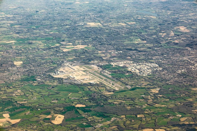 Aerial view of Gatwick Airport and the surrounding towns, villages and countryside of West Sussex