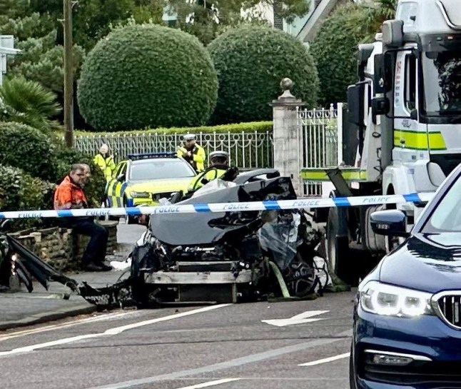 BNPS.co.uk (01202 558833) Pic: BNPS Pictured: The crash scene in Sandbanks Two brothers have appeared in court charged with causing serious injury to a teenage girl during a high speed 'chase' on the millionaire's row of Sandbanks. Henry and Harrison Taylor are alleged to have been on a loop around the exclusive peninsula in Poole Harbour in a BMW 135i and a Mercedes when they crashed. Mia Savage, who was a front seat passenger in the Mercedes, suffered serious injuries in the collision that happened at 1am on Boxing Day 2023.