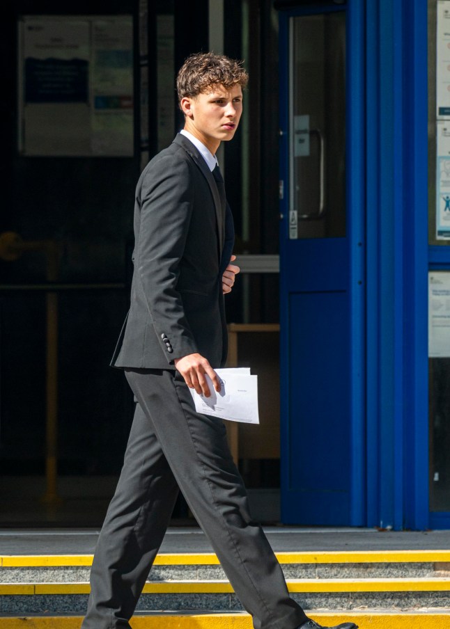 BNPS.co.uk (01202 558833) Pic: BNPS Pictured: Harrison Taylor leaving Poole Magistrates Court. Two brothers have appeared in court charged with causing serious injury to a teenage girl during a high speed 'chase' on the millionaire's row of Sandbanks. Henry and Harrison Taylor are alleged to have been on a loop around the exclusive peninsula in Poole Harbour in a BMW 135i and a Mercedes when they crashed. Mia Savage, who was a front seat passenger in the Mercedes, suffered serious injuries in the collision that happened at 1am on Boxing Day 2023.