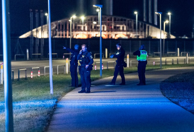 epa12398542 Danish police officers are present at Copenhagen Airport, planes cannot land or take off due to drone sightings, in Copenhagen, Denmark 22 September 2025. EPA/STEVEN KNAP DENMARK OUT