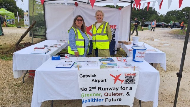 Liz Lockwood and a friend campaigning against Gatwick's expansion