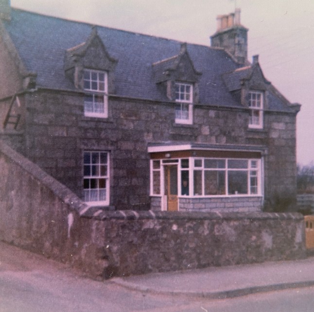 The cottage in the 70s. // A couple who bought their grandparent's old cottage were stunned when they renovated it - and found notes from them behind the wallpaper. The grey cottage in the Aberdeenshire village of New Deer used to belong to Mark Strathan's late grandparents, Nellie and Wullie. When Mark Strathan and Mark Cunningham stripped the old wallpaper they uncovered notes on the walls - including handwritten signatures by Mr Strathan's grandparents. Photo released 28/09/2025