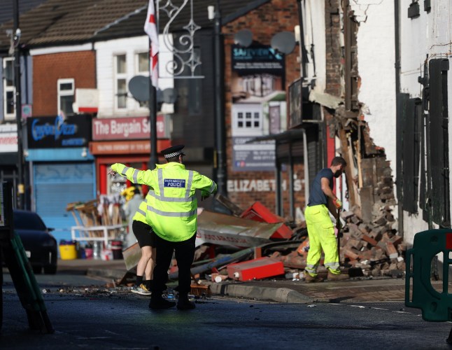 A car has crashed into a building on Bridge St in Heywood . 28 September 2025.