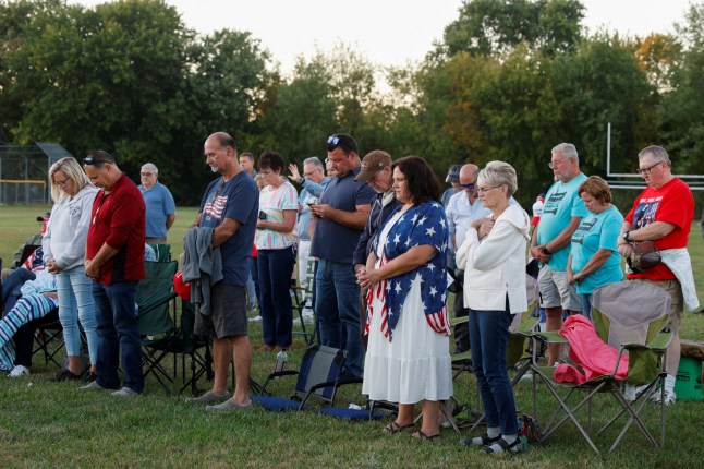 People attend a prayer vigil held against violence, following a shooting that took place at the Church of Jesus Christ of Latter-day Saints, in Burton, Michigan, U.S., September 28, 2025. REUTERS/Rebecca Cook