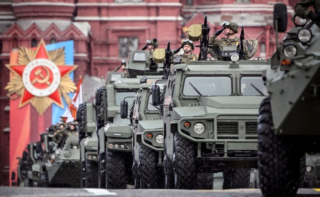 Russian military vehicles drive on Red Square during the Victory Day military parade in central Moscow on May 9, 2024. Russia celebrates the 79th anniversary of the victory over Nazi Germany in World War II. (Photo by Alexander NEMENOV / AFP) (Photo by ALEXANDER NEMENOV/AFP via Getty Images)