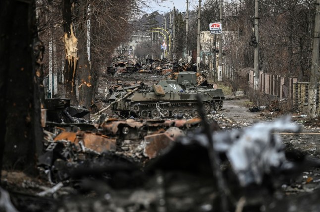 TOPSHOT - This general view shows destroyed Russian armored vehicles in the city of Bucha, west of Kyiv, on March 4, 2022. - The UN Human Rights Council on March 4, 2022, overwhelmingly voted to create a top-level investigation into violations committed following Russia's invasion of Ukraine. More than 1.2 million people have fled Ukraine into neighbouring countries since Russia launched its full-scale invasion on February 24, United Nations figures showed on March 4, 2022. (Photo by ARIS MESSINIS / AFP) (Photo by ARIS MESSINIS/AFP via Getty Images) *** BESTPIX ***