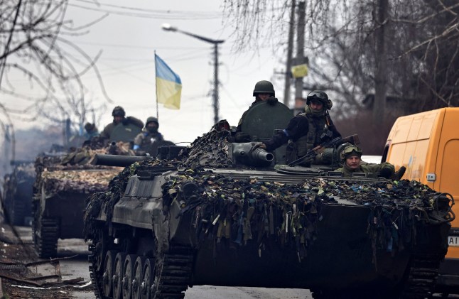 Ukrainian soldiers are pictured in their tanks, amid Russia's invasion on Ukraine in Bucha, in Kyiv region, Ukraine April 2, 20022. REUTERS/Zohra Bensemra