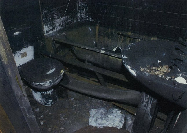 Crown Prosecution Service undated handout photo of the bathroom at Victory Road, Allenton, Derby after the fire where six children died. Mick Philpott and Mairead Philpott was today found guilty of manslaughter at Nottingham Crown Court over the house fire in Derby which killed his six children. PRESS ASSOCIATION Photo. Issue date: Tuesday April 2, 2013. See PA story COURTS Fire. Photo credit should read: CPS/PA Wire NOTE TO EDITORS: This handout photo may only be used in for editorial reporting purposes for the contemporaneous illustration of events, things or the people in the image or facts mentioned in the caption. Reuse of the picture may require further permission from the copyright holder.