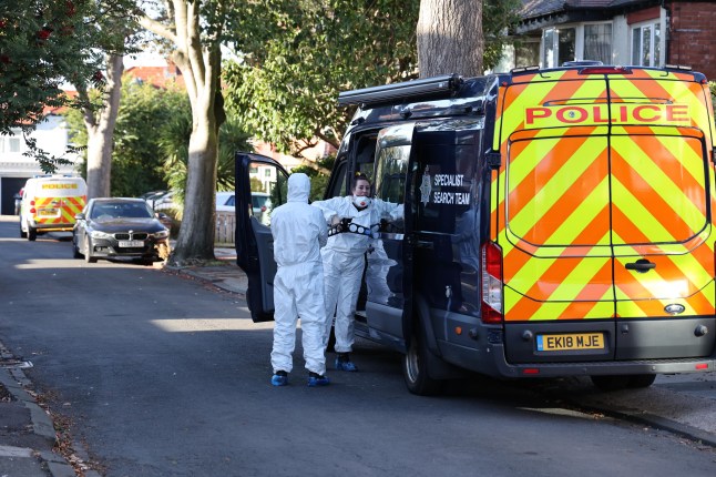forensic officers sweep a property in Tyneside
