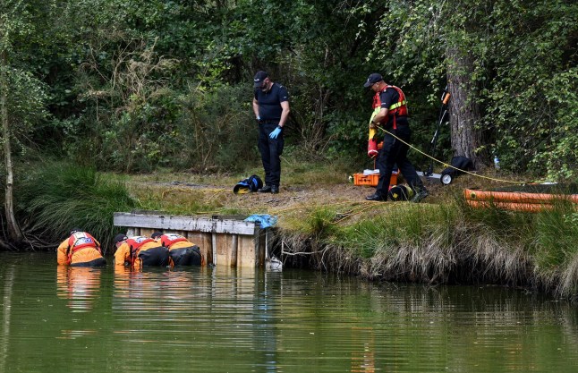 Pictured: Police divers from Hampshire Constabulary Marine Unit search the pond where the girl was found on Kingsley Common, Bordon, Hants.??????A police marine unit today searched the village pond where tragic Annabel Mackey was found unconscious. Specialist officers from Hampshire Constabulary???s Marine Unit carried out an underwater search as part of the force???s ongoing murder investigation. Three marine officers were seen crawling on their hands and knees in the water, meticulously scouring the shallow pond floor for evidence. The specific area of Kingsley Pond the officers searched - where it is believed little Annabel was found - appeared to be little more than 1ft deep. SEE OUR COPY FOR DETAILS. ?? Ollie Thompson/Solent News & Photo Agency UK +44 (0) 2380 458800