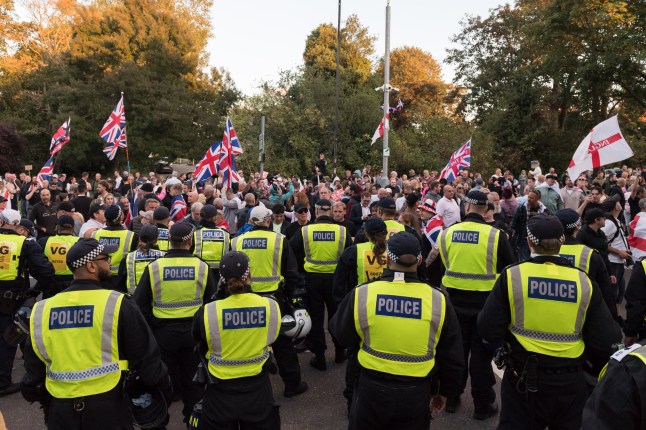 EPPING, UNITED KINGDOM - AUGUST 31: Demonstrators gather outside The Civic Offices in a protest against housing of asylum seekers at The Bell Hotel in Epping, United Kingdom on August 31, 2025. On Friday, the Court of Appeal has overturned a temporary injunction, revoking a ban on housing asylum seekers at The Bell Hotel in Epping near London, with the case due for trial in October. (Photo by Wiktor Szymanowicz/Anadolu via Getty Images)