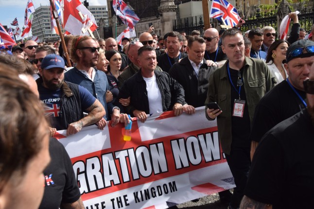 Mandatory Credit: Photo by Vuk Valcic/SOPA Images/Shutterstock (15485185j) Far-right figure Tommy Robinson (c), whose real name is Stephen Yaxley-Lennon, takes part in the 'Unite The Kingdom' march in Westminster. Right-wing protesters marched to Westminster and staged a rally against immigration and the government outside Downing Street, organised by far-right activist Tommy Robinson, whose real name is Stephen Yaxley-Lennon. Unite The Kingdom Far Right March in London, UK - 13 Sep 2025