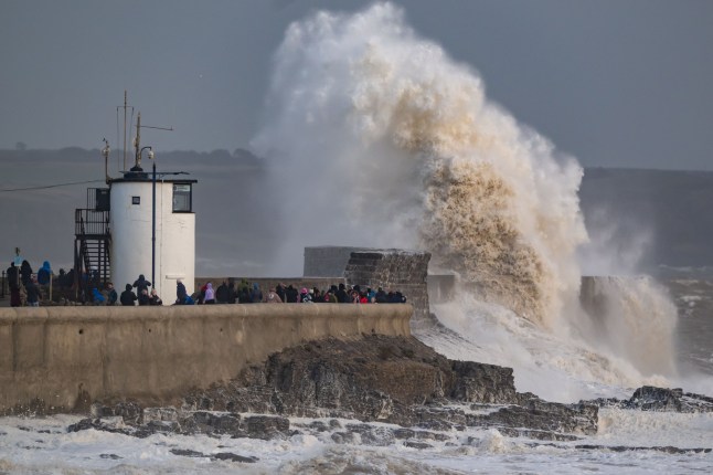 PORTHCAWL, WALES - OCTOBER 4: Waves crash against the harbour wall on October 4, 2025 in Porthcawl, Wales. The Met Office has issued a yellow weather warning for wind for Storm Amy which is the first named storm of the year. (Photo by Matthew Horwood/Getty Images)