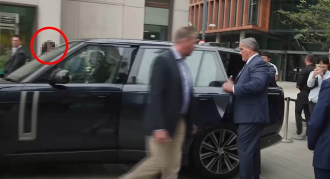 An image thought to show a woman known as a stalker of Prince Harry's behind the Duke's Range Rover.