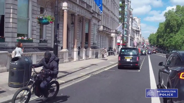 Police observe chase and arrest two e-bike thieves who committed a series of phone snatches across central London, including taking two phones (shown in grabs) on Piccadilly. material relating to Operation Echosteep: gang leaders responsible for exporting half of all phones stolen in the UK abroad have been arrested in the biggest phone theft sting operation in the world. ** ALL MATERIAL strictly embargoed until 10pm on October the 6th **
