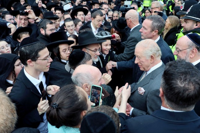 Britain's King Charles meets members of the community during a visit to Heaton Park Hebrew Congregation Synagogue in Manchester, Britain, October 20, 2025. Chris Jackson/Pool via REUTERS