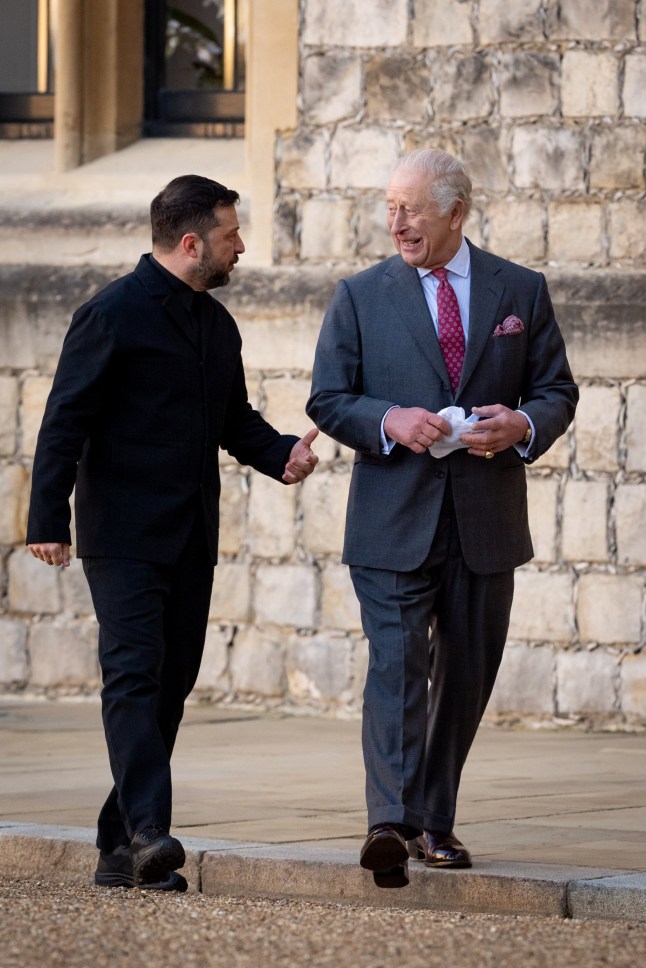Ukrainian President Volodymyr Zelensky and King Charles III after inspecting a guard of honour at Windsor Castle, Berkshire. Picture date: Friday October 24, 2025. PA Photo. Photo credit should read: Aaron Chown/PA Wire