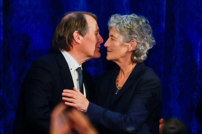 President-elect Catherine Connolly receives congratulations from her husband Brian McEnery at Dublin Castle, on the day of the announcement of the results of the Irish presidential election in Dublin, Ireland, October 25, 2025. REUTERS/Clodagh Kilcoyne