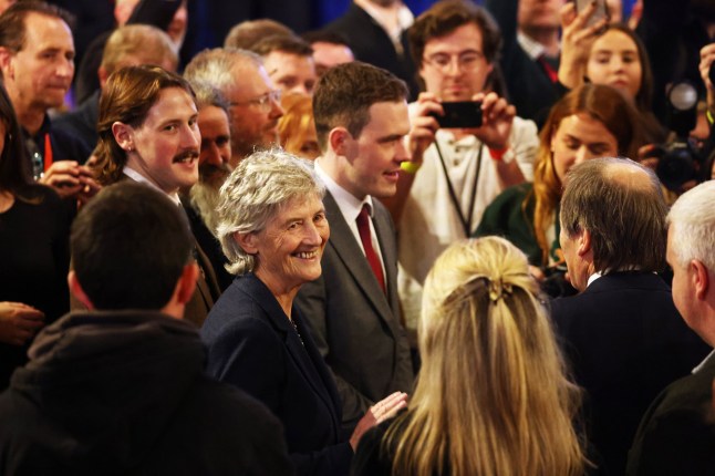 Catherine Connolly smiles to supporters after being elected as the new President of Ireland at Dublin Castle, Ireland, Saturday, Oct. 25, 2025. (AP Photo/Peter Morrison)