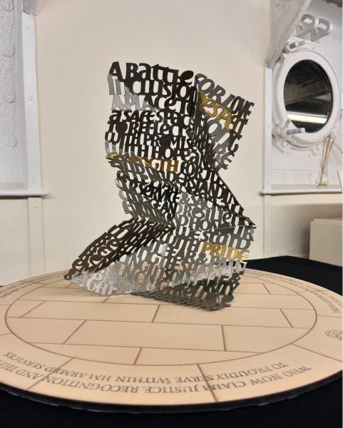 A new memorial for the LGBT+ armed forces community will be constructed in the National Memorial Arboretum in Staffordshire. The design and construction, overseen by LGBT military charity Fighting with Pride, is being funded by a ?350,000 grant from the Office for Veterans? Affairs in the Ministry of Defence. Abraxas Academy?s design ? entitled ?The Opened Letter? ? was selected by a judging panel on Friday 10 January at an event onboard HMS Wellington, moored on the River Thames in London. The event was attended by LGBT+ veterans and serving personnel, service charities and the shortlisted artists.