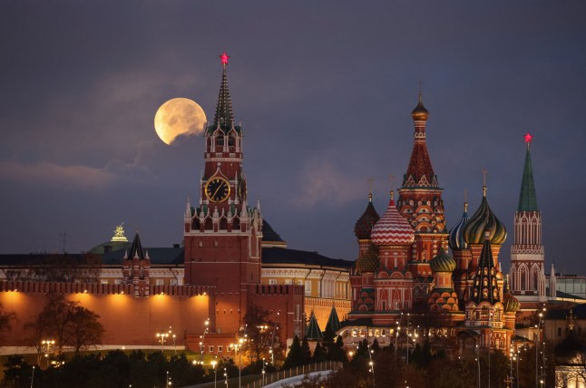 The Beaver Moon, a type of supermoon, sets behind Kremlin and St. Basil's Cathedral in Moscow, Russia November 5, 2025. REUTERS/Marina Lystseva