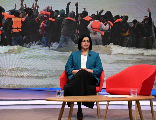 Shabana Mahmood appearing on the BBC1 current affairs programme, Sunday with Laura Kuenssberg with an image of asylum seekers on boats behind her