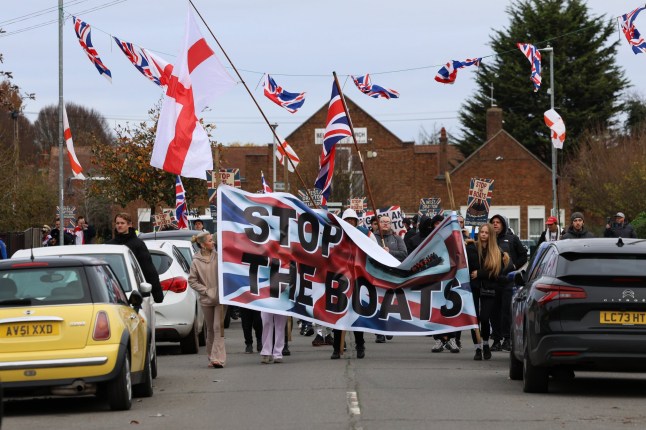 ? Licensed to London News Pictures.16/11/2025. West Drayton, UK. Local residents and campaigners take part in an anti-asylum protest towards the Crowne Plaza hotel, West Drayton, London, which houses asylum-seekers. Home Secretary, Shabana Mahmood is expected to announce changes to Britain?s asylum system on Monday in an attempt to quell rising fears about immigration. Photo credit: Jacqueline Lawrie/LNP