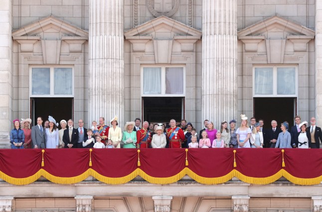 LONDON, ENGLAND - JUNE 08: (L-R) Albert Windsor, Britain's Prince William, Duke of Cambridge holding Prince Louis, Prince George, Princess Charlotte, Britain's Catherine, Duchess of Cambridge, Britain's Camilla, Duchess of Cornwall, Vice Admiral Timothy Laurence, Britain's Prince Charles, Prince of Wales, Britain's Princess Beatrice of York, Britain's Princess Anne, Princess Royal,, Britain's Queen Elizabeth II, Britain's Princess Eugenie of York, Britain's Lady Louise Windsor, Britain's Prince Andrew, Duke of York,, Britain's Prince Harry, Duke of Sussex, Britain's Meghan, Duchess of Sussex, Isla Phillips, James, Viscount Severn, Savannah Phillips, Peter Phillips, Autumn Phillips, Lyla Gilman, Eloise Taylor and Britain's Lady Helen Taylor stand with other members of the Royal Family on the balcony of Buckingham Palace to watch a fly-past of aircraft by the Royal Air Force during Trooping The Colour, the Queen's annual birthday parade, on June 08, 2019 in London, England. (Photo by Chris Jackson/Getty Images)