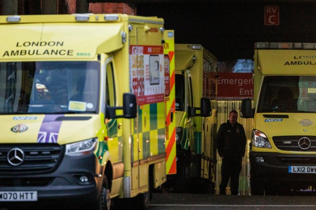 epa11053830 Ambulances and emergency staff wait at the Emergency Department (A&E) of Whipps Cross Hospital in London, Britain, 02 January 2024. A six-day strike over pay by junior doctors from the British Medical Association (BMA) is set to take place from 03 to 9 January 2024. The longest continuous stretch of industrial action in the history of the National Health Service (NHS) will come at a time of rising rates of flu, Covid and other winter infections, making it one of the most difficult starts to the year for the service since it was founded in 1948. EPA/TOLGA AKMEN