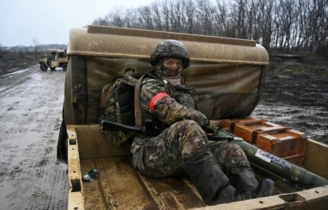 A Russian service member rides in the back of a military buggy during combat training at a firing range, in the course of Russia-Ukraine conflict, in Krasnodar region, Russia December 12, 2024. REUTERS/Sergey Pivovarov TPX IMAGES OF THE DAY