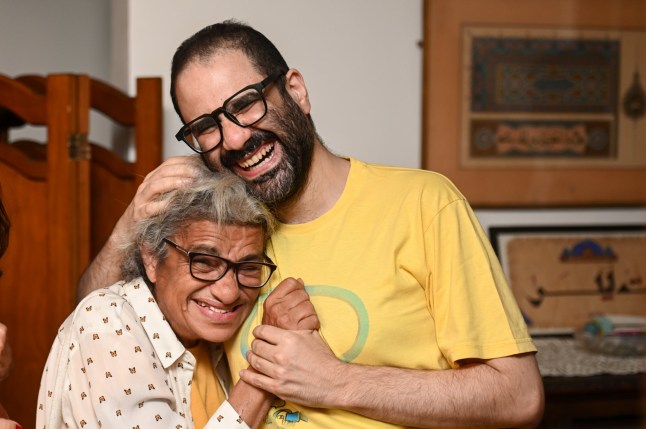 CAIRO, EGYPT - SEPTEMBER 23: The British-Egyptian activist and blogger Alaa Abd El-Fattah and his mother, Laila Soueif, are at his home after his release on September 23, 2025 in Cairo, Egypt. Alaa Abd el-Fattah, (also spelled Alaa Abdel Fattah) a British-Egyptian writer and pro-democracy activist who has spent more than 10 years as a political prisoner in Egypt, was pardoned by Egypt's President Abdel Fattah el-Sisi on Monday. (Photo by Sayed Hassan/Getty Images)