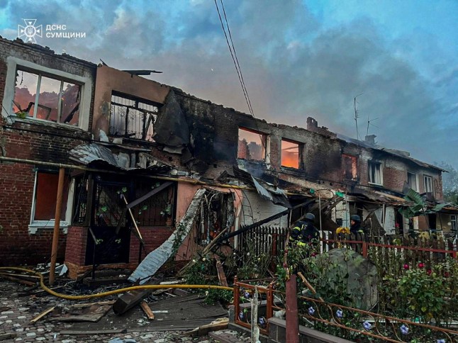 Firefighters work at the site of a Russian drone strike, amid Russia's attack on Ukraine, in Sumy region, Ukraine in this handout picture released September 30, 2025. Press service of the State Emergency Service of Ukraine in Sumy region/Handout via REUTERS ATTENTION EDITORS - THIS IMAGE HAS BEEN SUPPLIED BY A THIRD PARTY. MUST NOT OBSCURE LOGO.