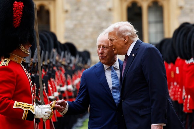 WINDSOR, ENGLAND - SEPTEMBER 17: King Charles III and US President Donald Trump inspect the Guard of Honour during the State visit by the President of the United States of America at Windsor Castle on September 17, 2025 in Windsor, England. (Photo by Anna Moneymaker/Getty Images)