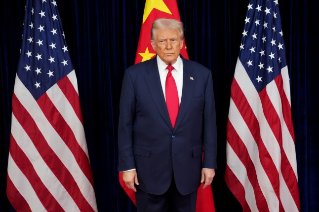 BUSAN, SOUTH KOREA - OCTOBER 30: U.S. President Donald Trump prepares to greet Chinese President Xi Jinping ahead of a bilateral meeting at Gimhae Air Base on October 30, 2025 in Busan, South Korea. Trump is meeting Xi for the first time since taking office for his second term, following months of growing tension between both countries. (Photo by Andrew Harnik/Getty Images)