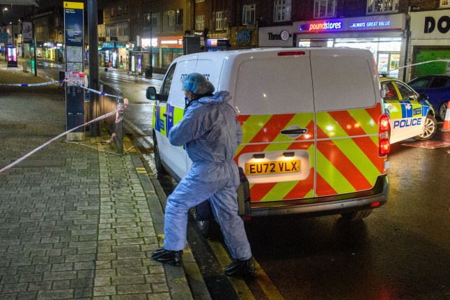 ?? Licensed to London News Pictures. 01/12/2025. London, UK. A forensic investigator at the scene on High Road in Wembley following the fatal stabbing of a man. Emergency services responded to reports of a stabbing in High Road (A404), Wembley, at 12:55GMT on Monday, 1 December 2025. A 22-year-old man was treated at the scene by paramedics from London Ambulance Service before being taken to hospital where he later died. Photo credit: Peter Manning/LNP