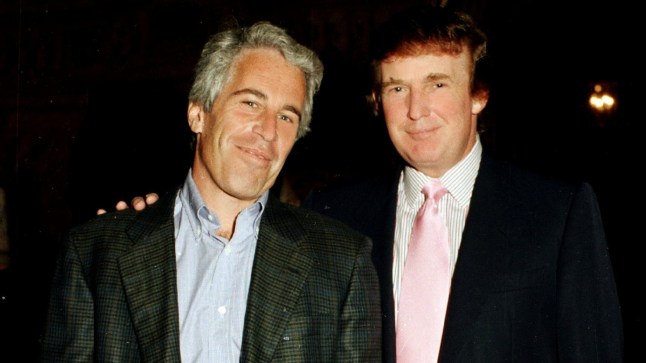 Portrait of American financier Jeffrey Epstein (left) and real estate developer Donald Trump as they pose together at the Mar-a-Lago estate, Palm Beach, Florida on February 22, 1997. (Photo by Davidoff Studios/Getty Images)