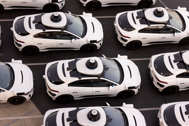 San Francisco, CA, USA - August 6, 2023: Aerial view of Alphabet's Waymo self-driving car fleet storage facility in the Bayview Hunter's Point district just before the California Public Utilities Commission is set to vote to allow Waymo and Cruise the ability to charge fares in San Francisco for complete driverless rides in the City.