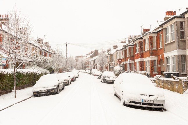 Snow covered cars in residential street, London, UK. (Photo by: Alex Segre/UCG/Universal Images Group via Getty Images)