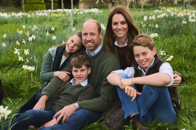 The Prince and Princess of Wales with their children posing for their Christmas portrait.