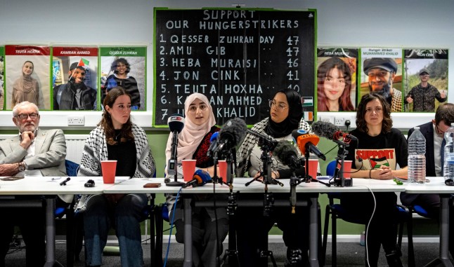 LONDON, ENGLAND - DECEMBER 18: Rahma Hoxha, the sister of Teuta Hoxha who is on hunger strike while being held on remand for offences related to activism on behalf of Palestine Action, speaks during a press conference relating to hunger-striking Palestine Action activists on December 18, 2025 in London, England. Supporters of the eight prisoners who continue to be held on remand as they await trial for alleged offences committed on behalf of Palestine Action before it was proscribed as a terrorist organisation, held a press conference calling on better treatment by the prison authorities and for the government to consider their demands which include being allowed access to mail, to read books without prior clearance and to be bailed before their trial. (Photo by Carl Court/Getty Images)