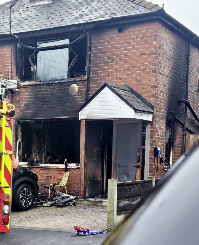 Fire damaged property in Leigh, Wigan. // A brave neighbour has been hailed a hero after saving a dad and his two daughters from a terrifying blaze that gutted their home. The fire tore through the semi-detached property in Leigh, Wigan, on Thursday morning - leaving a family-of-three homeless. Dramatic pictures show flames engulfing the house as neighbours watched in horror. Firefighters raced to the scene after the blaze broke out at around 6am, but the family had already been saved thanks to quick-thinking neighbours. Photo released 19/12/2025