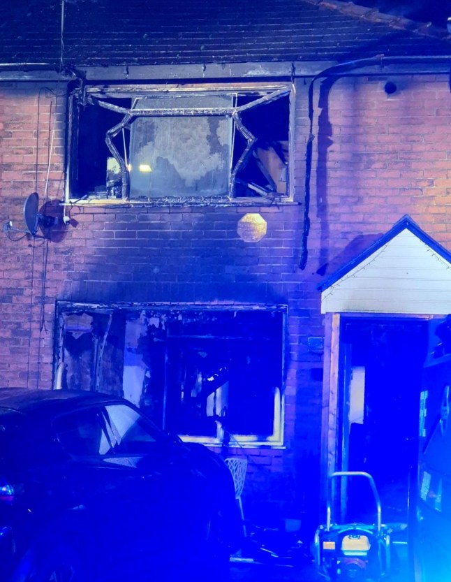 Fire damaged property in Leigh, Wigan. // A brave neighbour has been hailed a hero after saving a dad and his two daughters from a terrifying blaze that gutted their home. The fire tore through the semi-detached property in Leigh, Wigan, on Thursday morning - leaving a family-of-three homeless. Dramatic pictures show flames engulfing the house as neighbours watched in horror. Firefighters raced to the scene after the blaze broke out at around 6am, but the family had already been saved thanks to quick-thinking neighbours. Photo released 19/12/2025